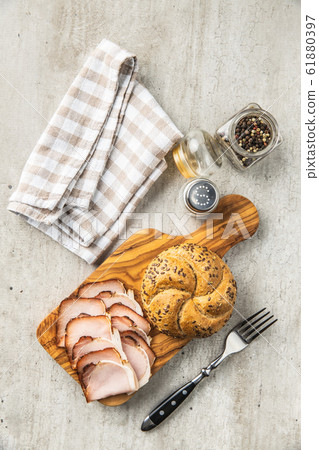 Sliced smoked ham. Tasty pork meat. 61880397