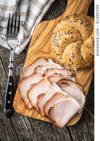 Sliced smoked ham. Tasty pork meat. Sliced smoked ham. Tasty pork meat. 61880398