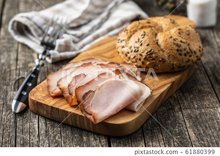 Sliced smoked ham. Tasty pork meat. Sliced smoked ham. Tasty pork meat. 61880399