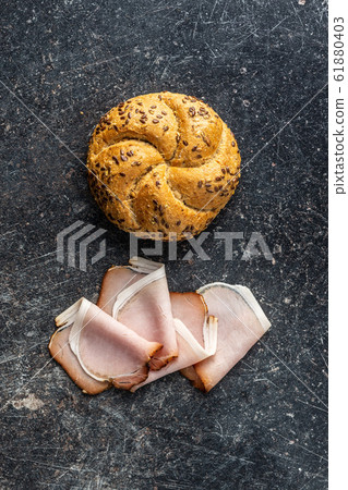 Sliced smoked ham. Tasty pork meat. 61880403