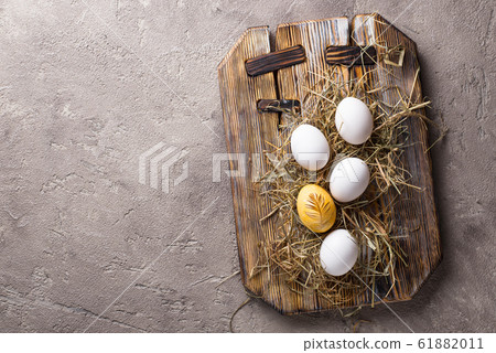 Easter painted chicken golden egg 61882011