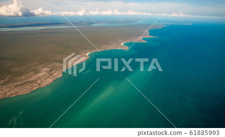 Aerial view and the landscape at the edge of Northern coast of Australia called Arafura sea in Northern Territory state of Australia. Aerial view and the landscape at the edge of Northern coast of Australia called Arafura sea in Northern Territory state of Australia. 61885993
