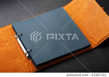 Photo album with blank black for photos. Split Photo album with blank black for photos. Split 61887101