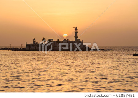 Haji Ali Dargah mosque and tomb on sunset. Mumbai. Haji Ali Dargah mosque and tomb on sunset. Mumbai. 61887481