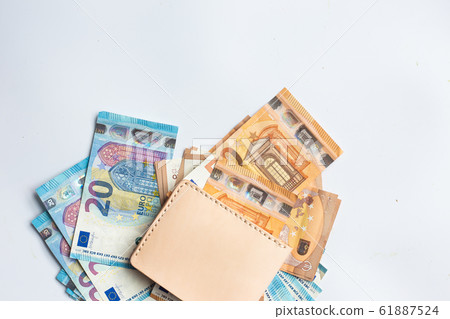 Leather wallet with euro money bill on white 61887524