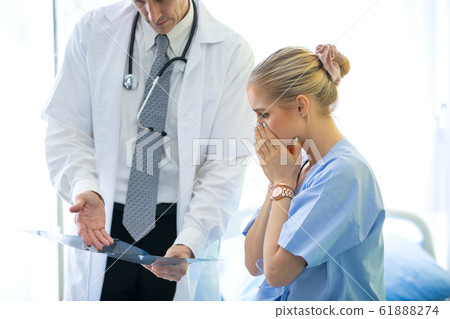 Doctor and patient in hospital 61888274