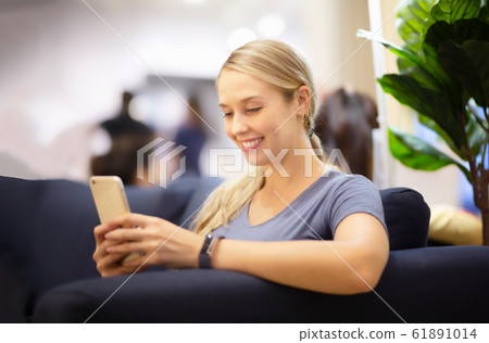 portrait shot of young women enjoy shopping in hardware store against shelf rack portrait shot of young women enjoy shopping in hardware store against shelf rack 61891014