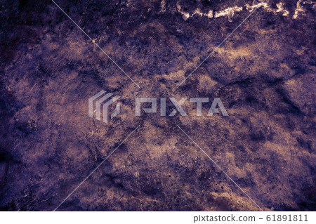 ancient dark purple granite stone surface of cave 61891811