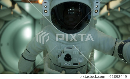 astronaut inside the orbital space station 61892449