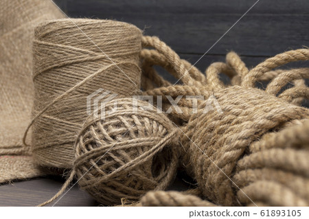 Jute twine, sackcloth fabric in close-up Jute twine, sackcloth fabric in close-up 61893105