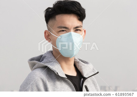 asian man wears protective mask asian man wears protective mask 61893567
