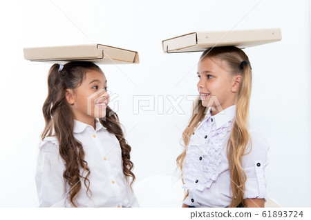 Find balance. Schoolgirls with cute pony tails Find balance. Schoolgirls with cute pony tails 61893724