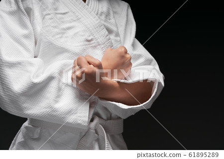 hands close up of a teenager athlete, dressed in hands close up of a teenager athlete, dressed in 61895289