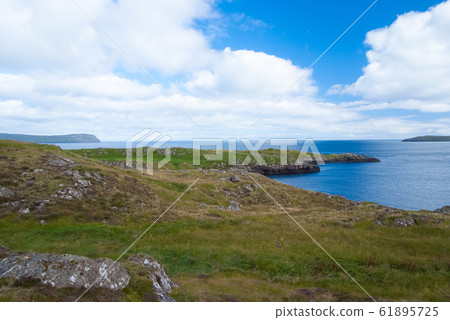 Sea view under cloudy sky from hilly coast in Sea view under cloudy sky from hilly coast in 61895725