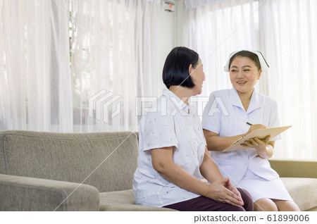 Mental health care concept,Professional psychologist writing note and consultation to senior asian woman patient,Suicide prevention,Positive attitude and open mind Mental health care concept,Professional psychologist writing note and consultation to senior asian woman patient,Suicide prevention,Positive attitude and open mind 61899006
