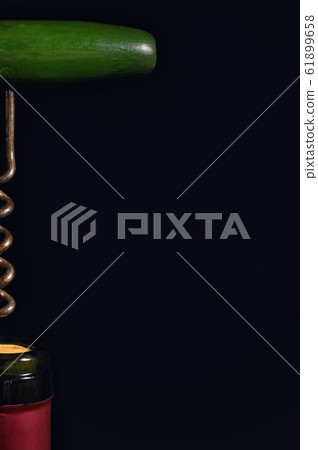 Wine Bottle And Corkscrew Isolated On Black 61899658