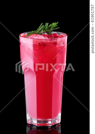 Glass of cranberry juice with crushed ice isolated Glass of cranberry juice with crushed ice isolated 61901787