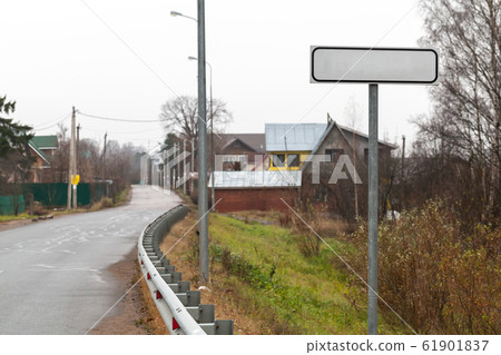 Empty road sign for town name Empty road sign for town name 61901837
