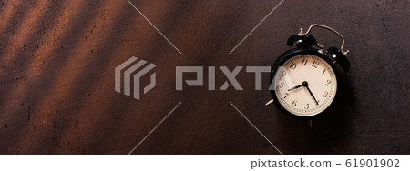 Banner with vintage alarm clock 61901902