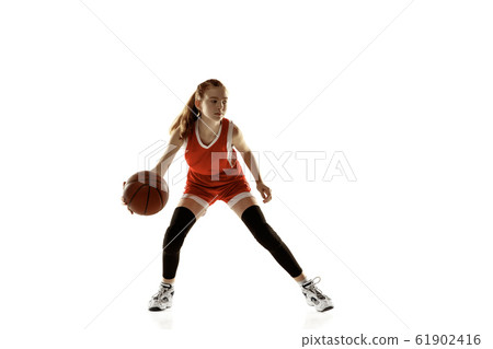 Young caucasian female basketball player against white studio background Young caucasian female basketball player against white studio background 61902416