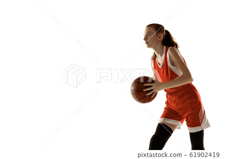 Young caucasian female basketball player against white studio background Young caucasian female basketball player against white studio background 61902419