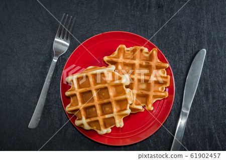 Waffles of Dutch, French and Belgian foods Waffles of Dutch, French and Belgian foods 61902457