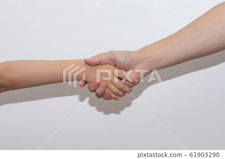 Handshake of children and adults 61903290