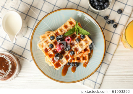 Composition of breakfast with belgian waffles, top 61903293