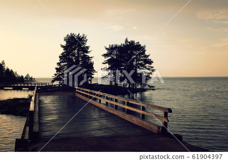 Pedestrian timber bridge on the Valaam island. 61904397