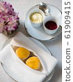 A tasty and delicious set of freshly baked scones 61909415