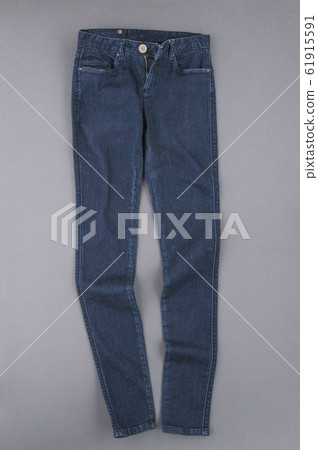 jeans on grey background jeans on grey background 61915591