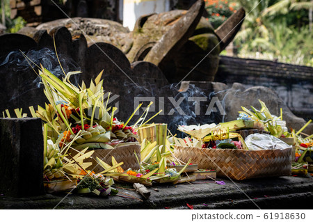 Incense and offerings in a Balinese temple 61918630