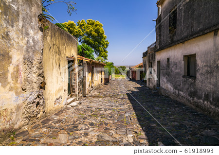 Colonial street and houses. Colonia. Uruguay. Colonial street and houses. Colonia. Uruguay. 61918993