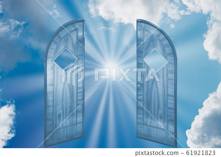 Sun shining on sky through open door Sun shining on sky through open door 61921823