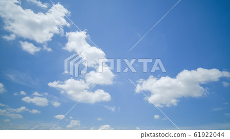 clear blue sky background,clouds with background. 61922044