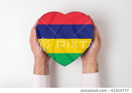 Flag of Mauritius on a heart shaped box in a male 61924777