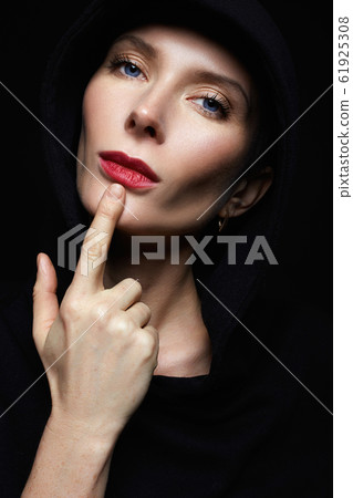beautiful woman in hood. red lips woman beautiful woman in hood. red lips woman 61925308