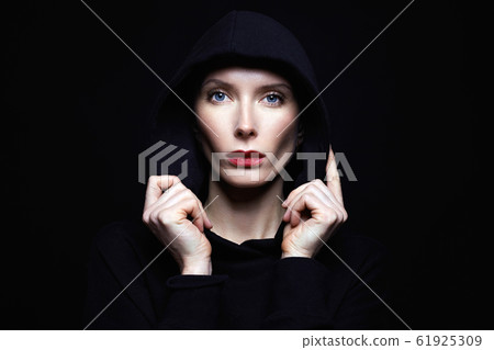 beautiful woman in hood. red lips woman in black beautiful woman in hood. red lips woman in black 61925309