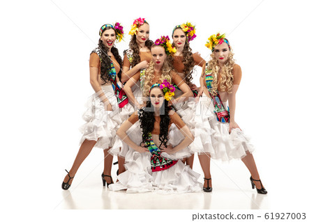 Beautiful young women in carnival and masquerade costumes on white studio background Beautiful young women in carnival and masquerade costumes on white studio background 61927003
