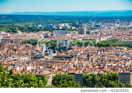 Lyon panorama elevated view on sunny day. Aerial panoramic view of Lyon with the skyline. Lyon Cityscape With City Hall And Opera Roofs. Lyon city in France 61929263