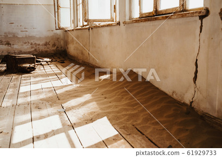 Sand has invaded and taken over this house 61929733