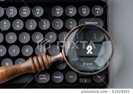 Medical retro keyboard with magnifying glass Medical retro keyboard with magnifying glass 61929841