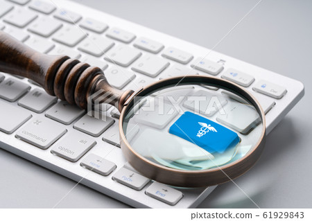 Medical retro keyboard with magnifying glass Medical retro keyboard with magnifying glass 61929843