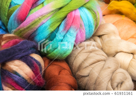 Background colored braids threads filmed close-up. 61931161