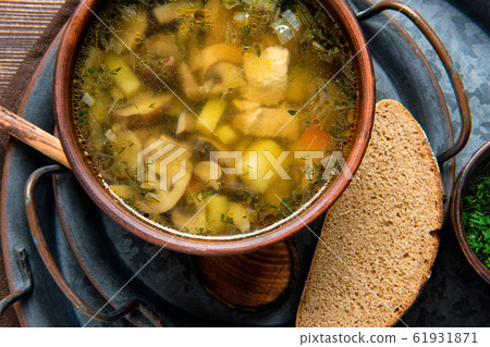 Overhead view of  plate with champignon soup 61931871