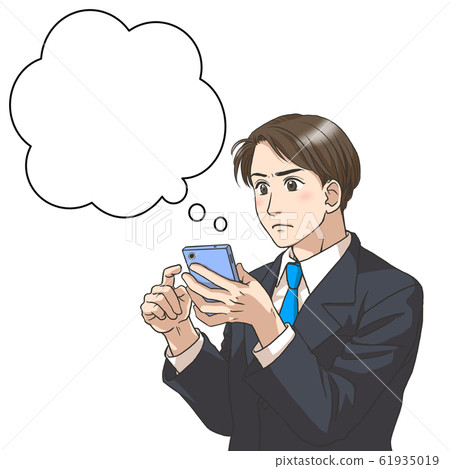 一個穿著西裝的男人使用智能手機 61935019