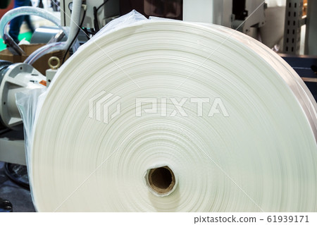 roll of cellophane from the conveyor in production 61939171
