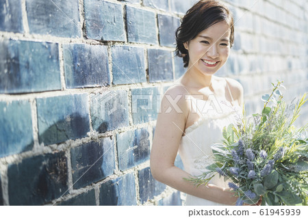 Bride on the street corner 61945939