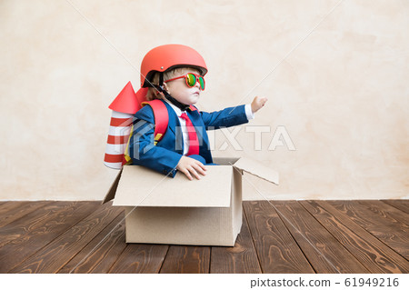Happy child playing at home 61949216