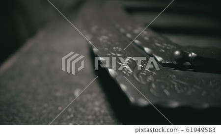 Forge workshop. The product is artificially aged. Gold powder painting of scratches, roughness and scuffs. Ageing. Aging processes. Pattern on iron. 61949583